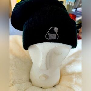 Black beanie with onigiri detail.